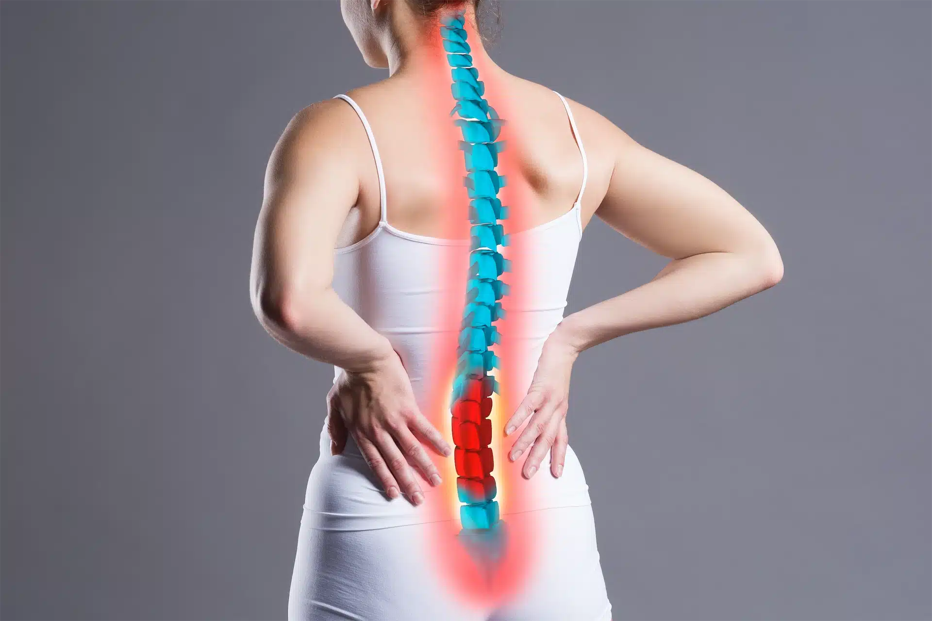 Image of a woman experiencing Sciatica pain with a highlighted spine, showing the importance of good posture